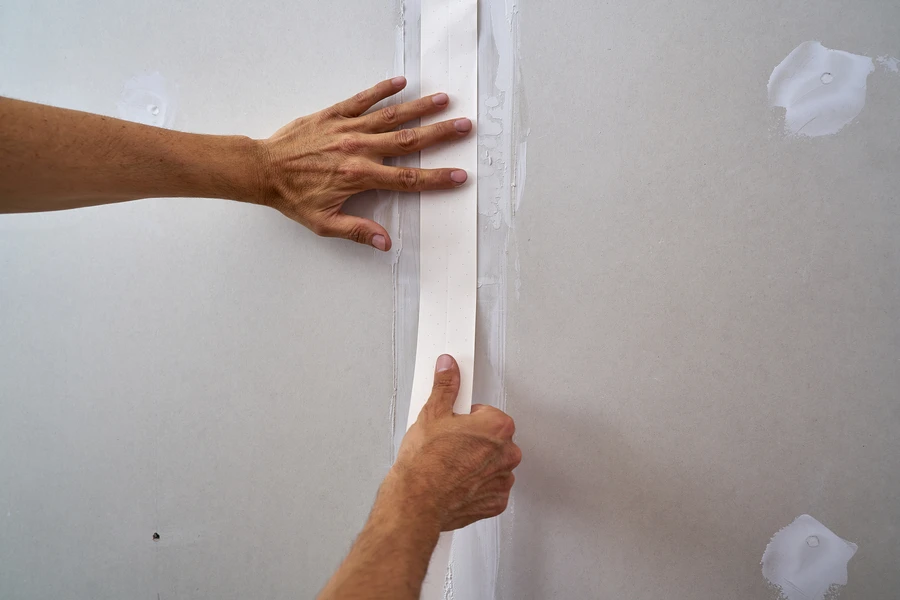 Comparing Paper Tape And Mesh Tape For Drywall Projects in Amherst, NH